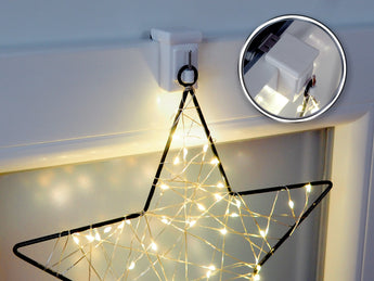 Verstellbarer Fensterhaken mit Weihnachtsdekoration am Fenster